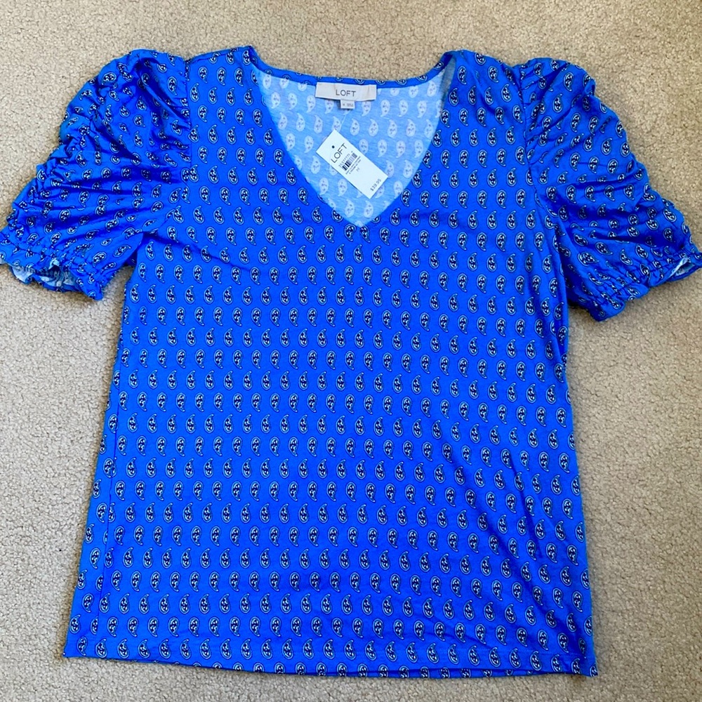 Brand new with tags loft shirt with ruffled sleeves. Size large.